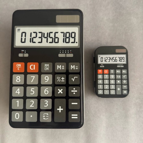 Storage boxes shaped like calculators, set of 2, like new