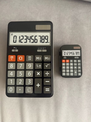 Storage boxes shaped like calculators, set of 2, like new