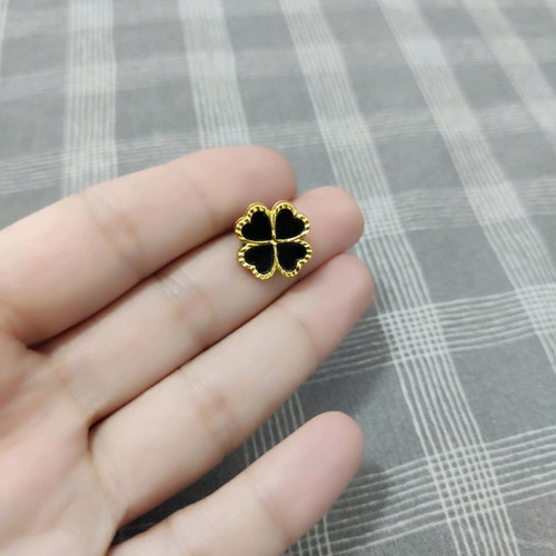 Gold earrings with black classic design, like new, steel