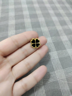 Gold earrings with black classic design, like new, steel