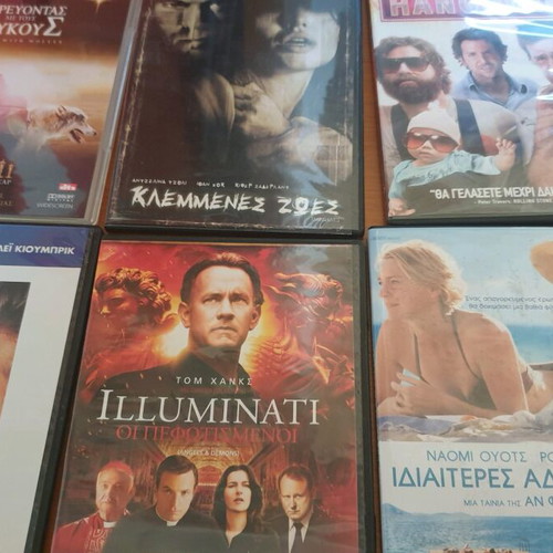 DVD pack of 55 new, 40 in hard case and 15 in paper