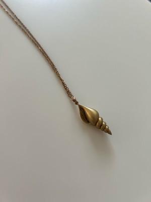 Myrto necklace 2025 charm used with discoloration on shell