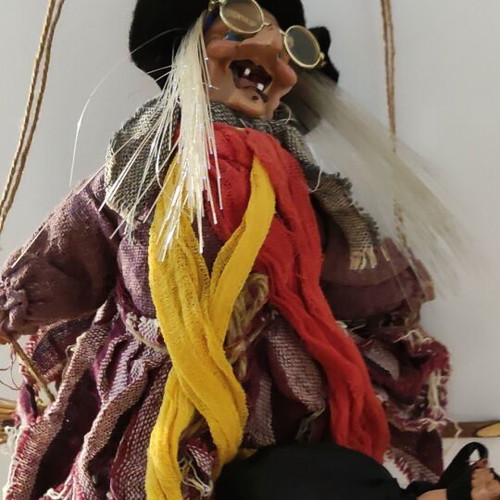 Witch figure used with sound and light-up hair