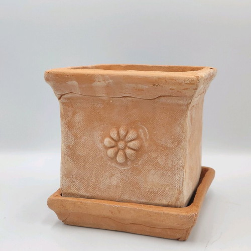 Square ceramic pot new from high-quality clay with saucer