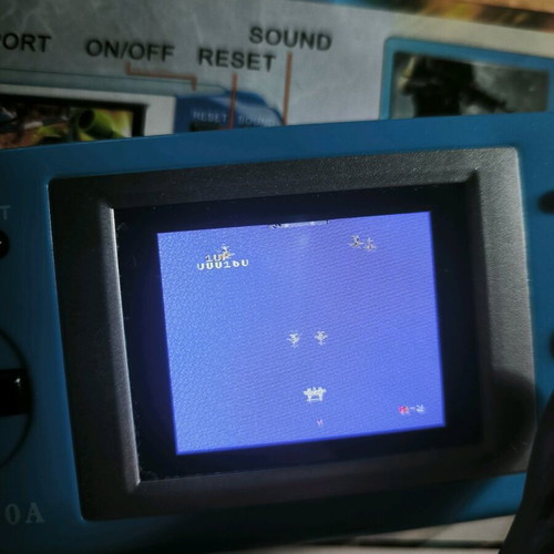 Hand consloe like new with many retro games