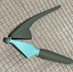 Garlic press used with ergonomic handle and easy cleaning