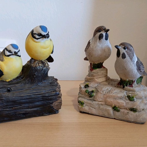 Two decorative birds like new