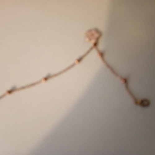 Rose gold bracelet with flower charm, 24 cm