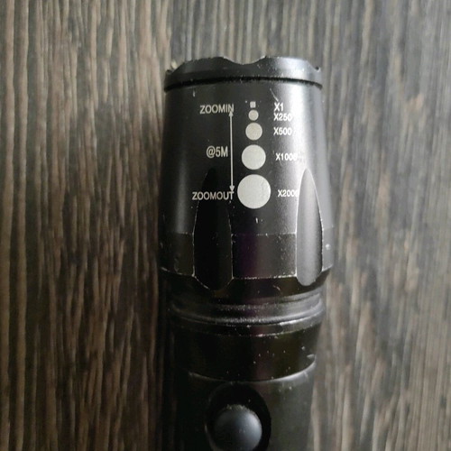 Led flashlight with focus beam capability used (zoom)