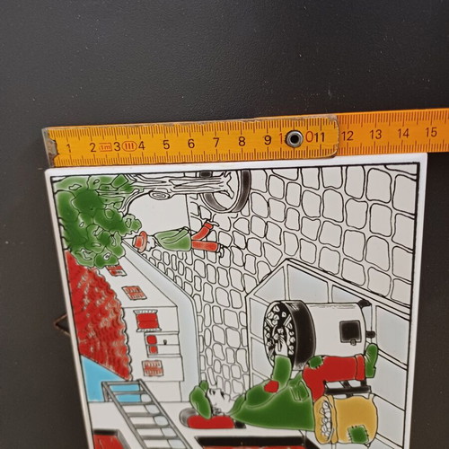 Ceramic tile decorative with traditional chestnut seller, like new