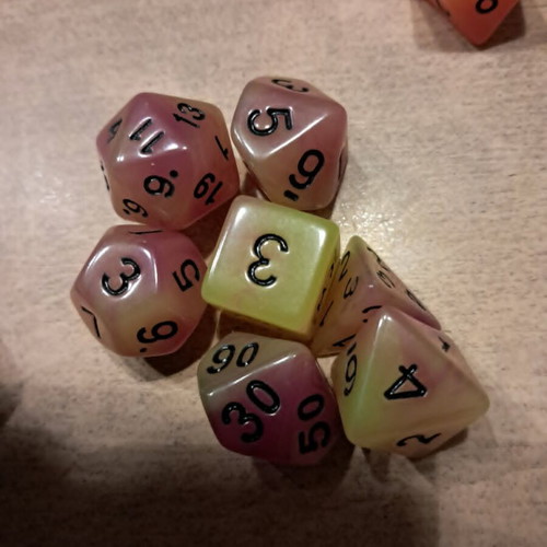 5 sets of glow in the dark D&D dice