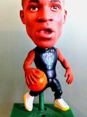 Giannis Antetokounmpo collectible figure and book like new