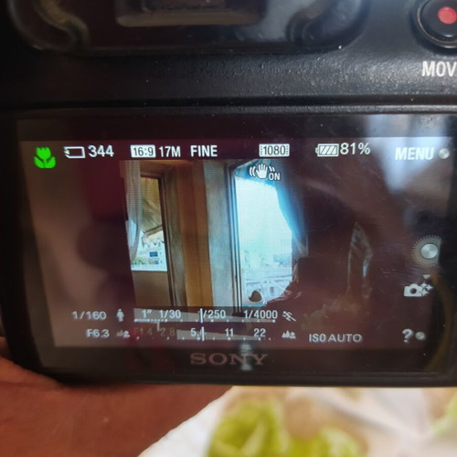 Sony A3000 camera used with E 18-55 3.5-5.6 OSS lens and accessories