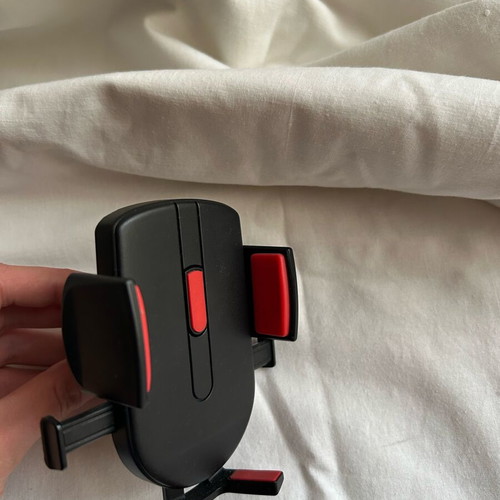 Car phone holder like new, air vent mount