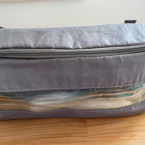 Delsey Paris large travel toiletry bag used, gray