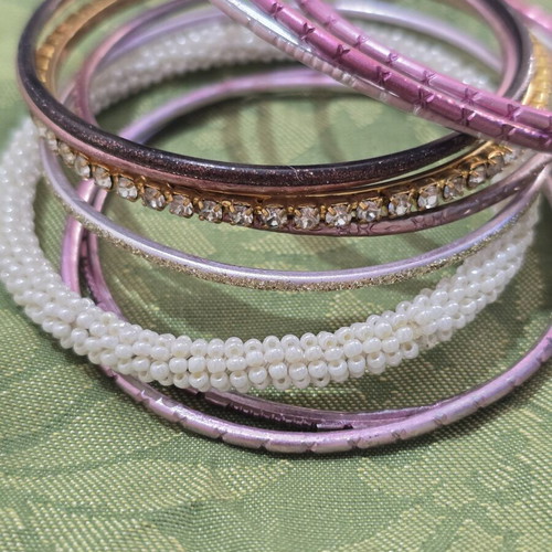 Bracelets new, pink and multicolor, all together