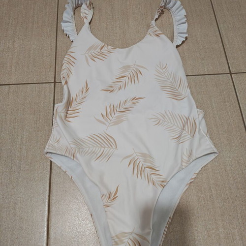 White one-piece swimsuit with open back