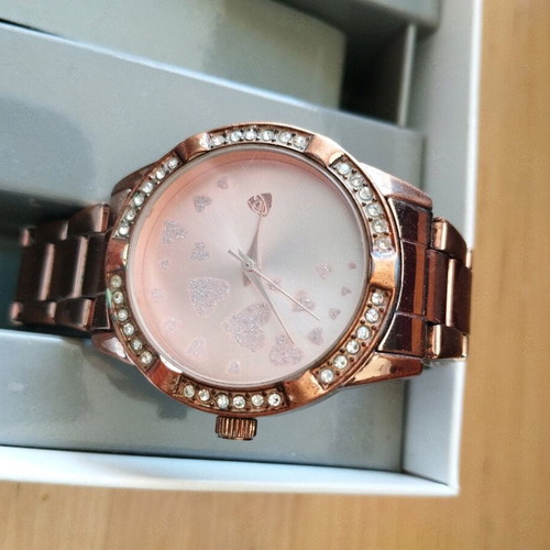Women's watch used, pink, needs new battery