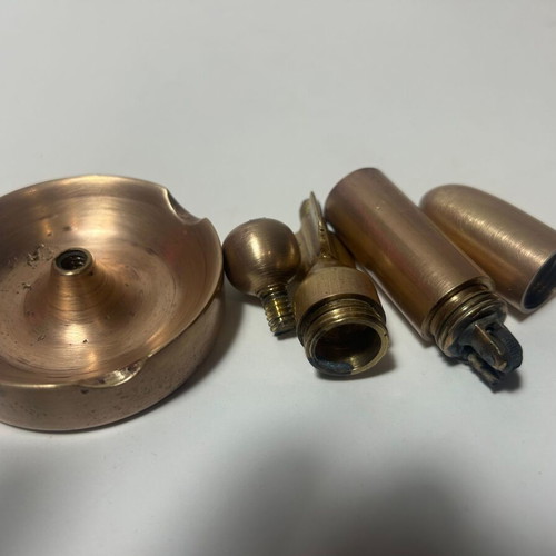 Bronze bullet-shaped ashtray lighter used