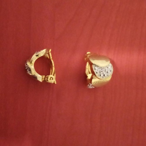 Gold earrings with rhinestones used, clip fastening