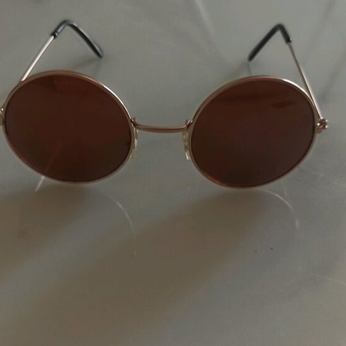 Round sunglasses used, metal frame, gold tone with brown lens
