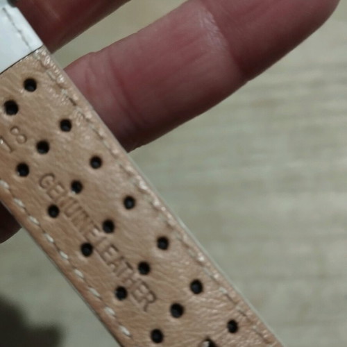 Women's watch used with white leather strap