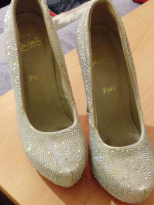 Christian Louboutin gold pumps new, size 38
