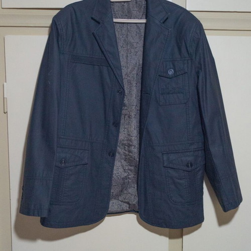 Brown jacket used, size L, with small scratch