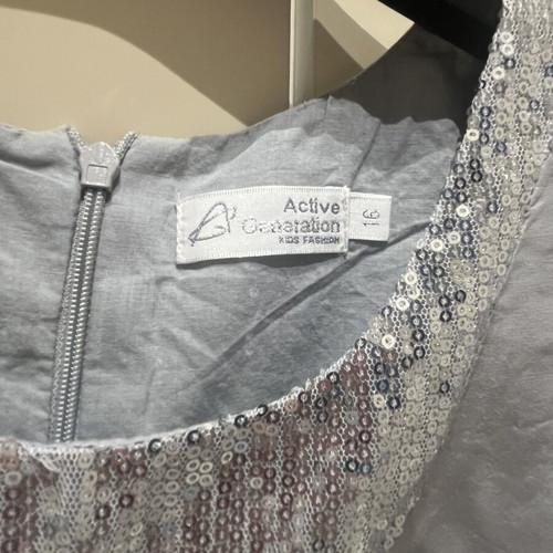 Active dress size 16 used, grey with silver sequins and lace