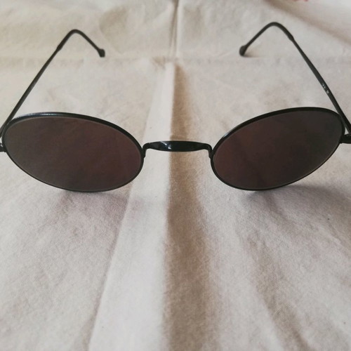 Oliver Peoples sunglasses used, black metal frame