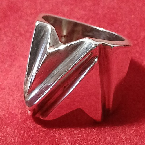 Silver ring with geometric design used