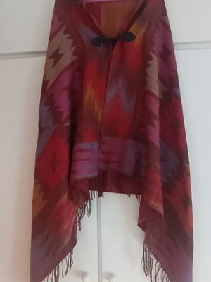 Montgomery poncho with hood and button closure like new, earth tones