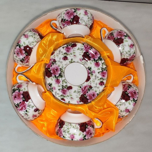 Vintage porcelain tea cups set with floral rose pattern and lithophany