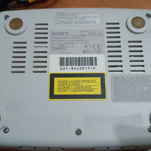 PSone slim console with third-party memory card and controller