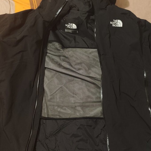 The North Face waterproof windbreaker jacket used, size large, black