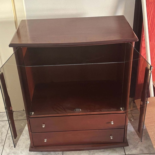 Wooden showcase with glass doors and drawers used