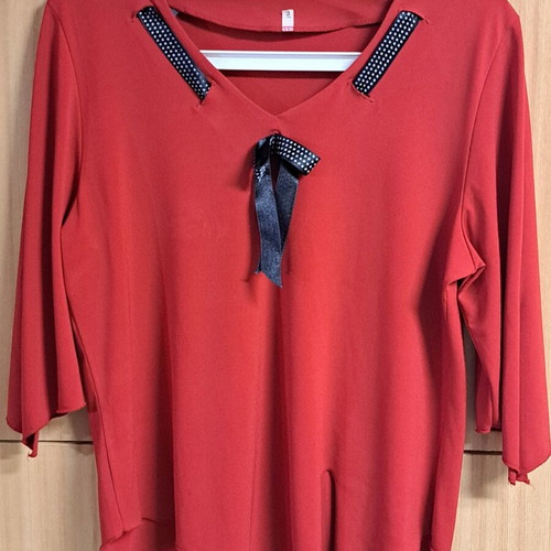 Women's elegant red blouse with black and white ribbon