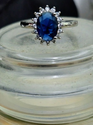 Women's ring with blue stone like new, size 8