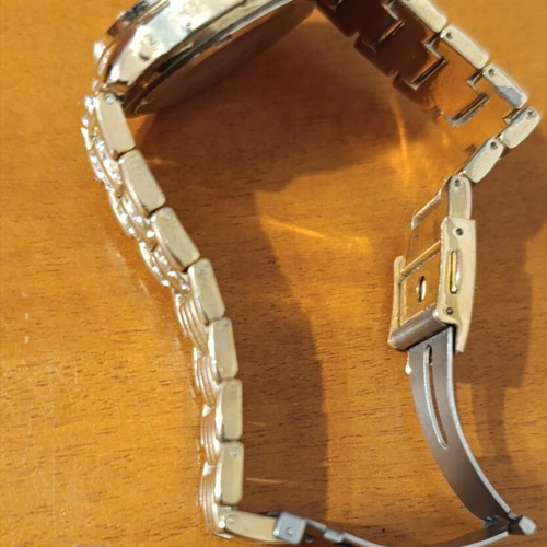 Daniel Klein wristwatch like new, gold bracelet, women's
