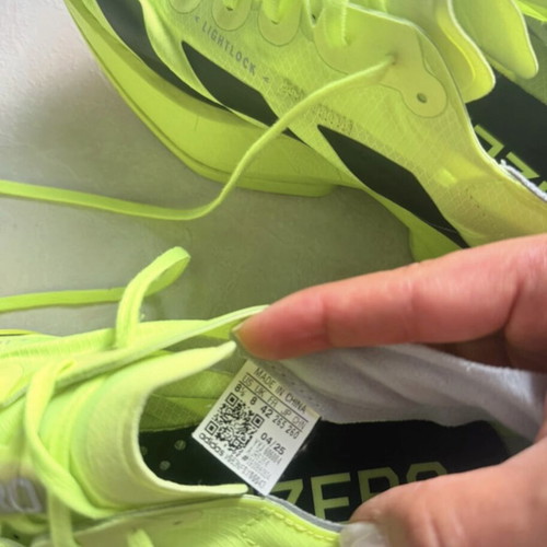 Adidas Adizero Adios Pro 4 running shoes, fluorescent yellow and black