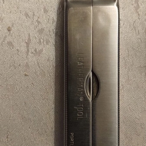 Leatherman multitool and tool adapter like new
