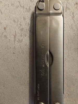 Leatherman multitool and tool adapter like new