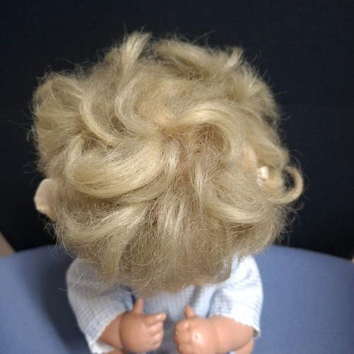 Vintage doll like new with child face, 30 cm tall