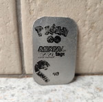 Large metal Pokémon cap used