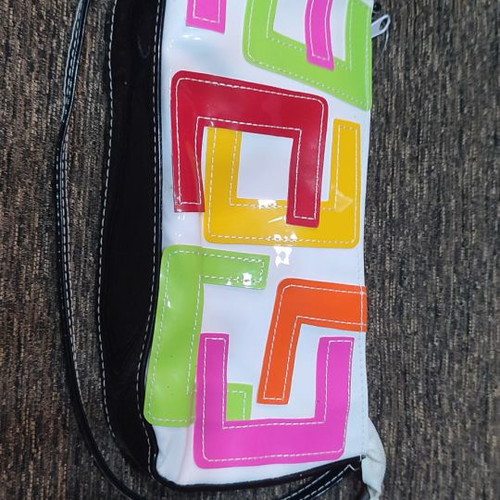 Handbag new with glossy texture and patterns