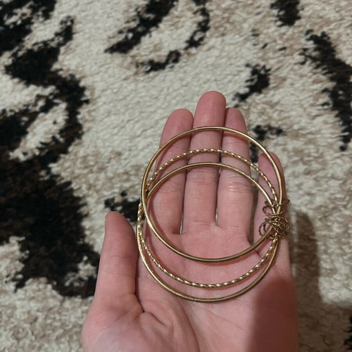 Unique gold-colored bracelet like new
