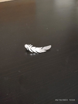 Feather earring like new, silver steel