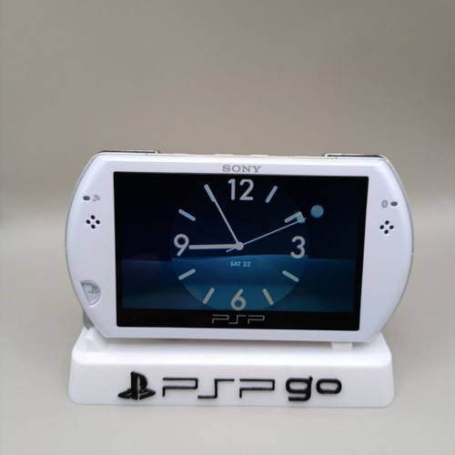 PSP Go white like new, hacked for free games, with charging cable