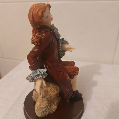 Terracotta figurine on wooden base new