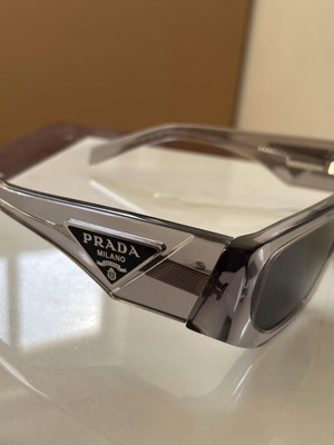 Prada sunglasses like new with transparent frame and grey lenses